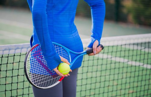 Woman playing Tennis