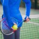 Woman playing Tennis