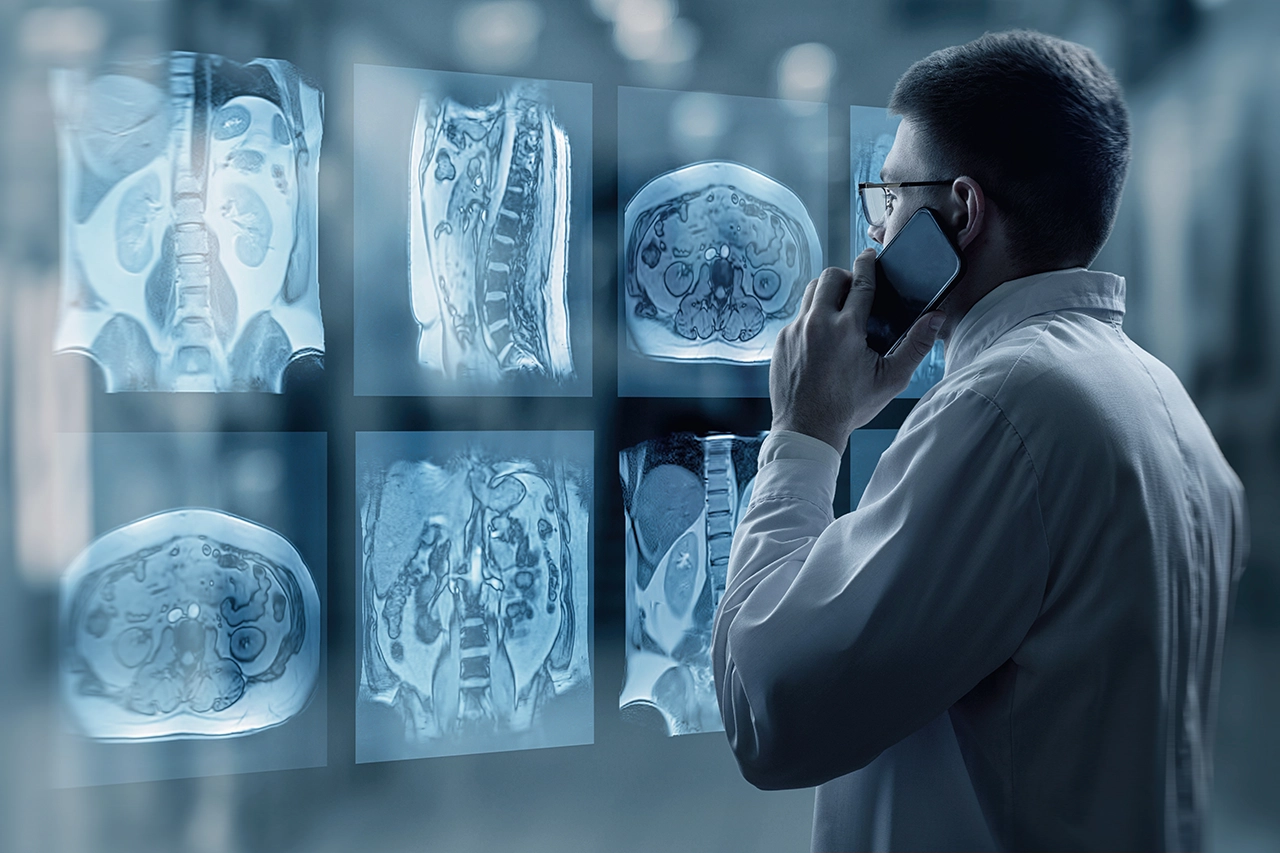 Radiologists of Indiana: Radiologist looking at x-rays